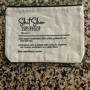 White and Black Pouch with Humorous Text